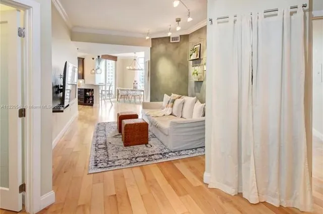 a living room with furniture and a table