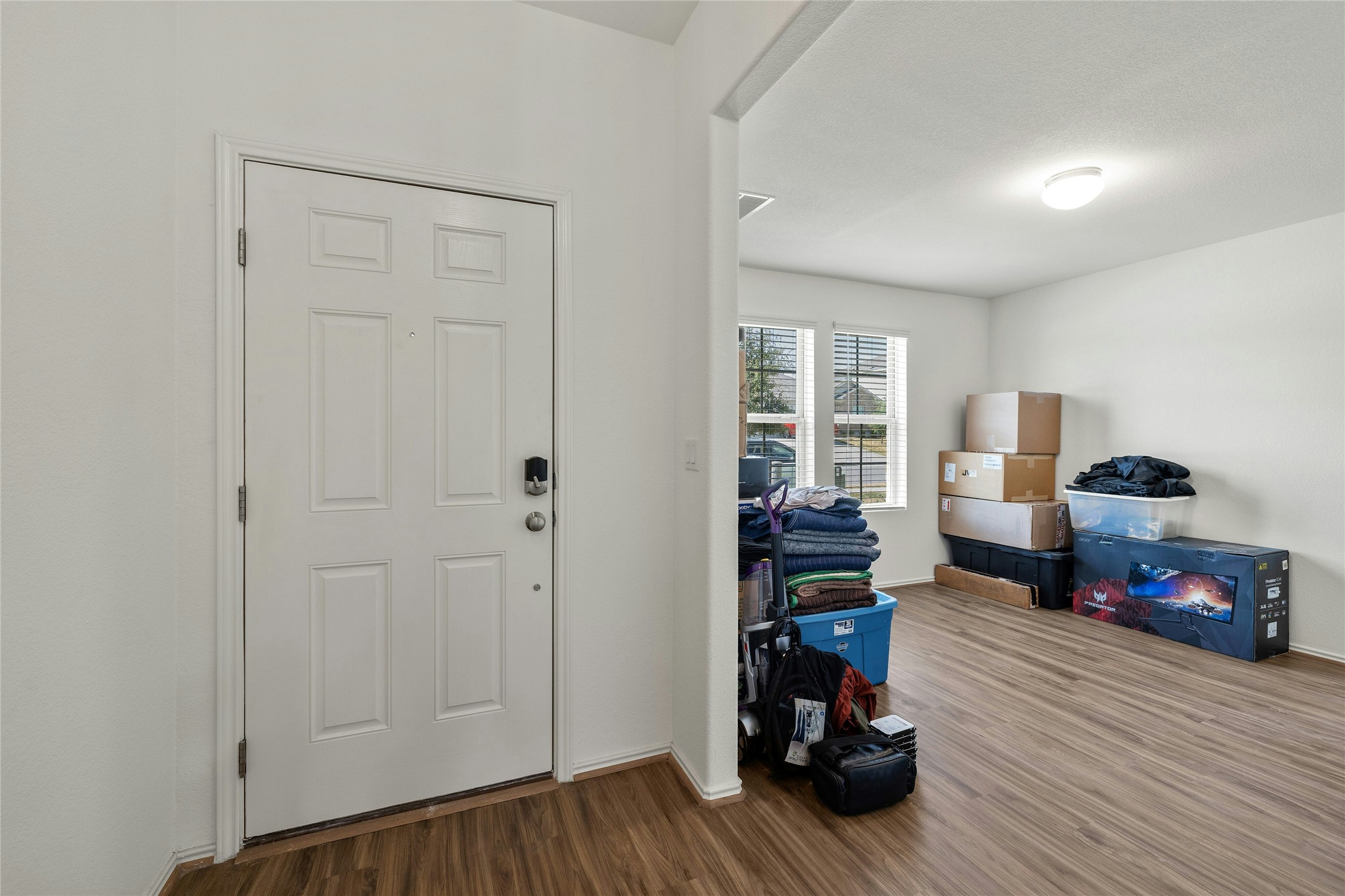 11813 Roscommon Trail Austin, TX 78754 - Photo 16 of 28 a living room with furniture and a wooden floor
