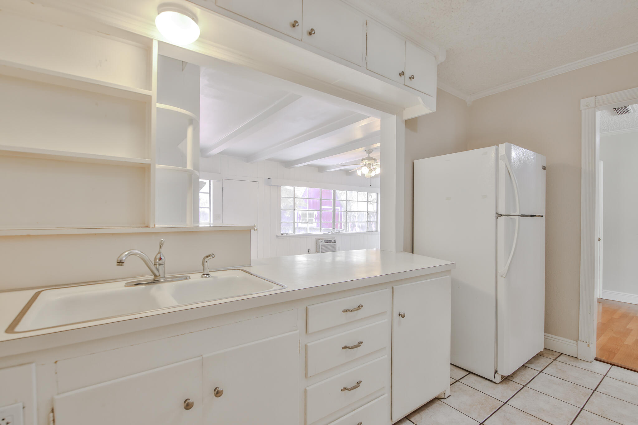 2715 29th Street Lubbock, TX 79410 - Photo 24 of 35 a bathroom with a sink and a mirror