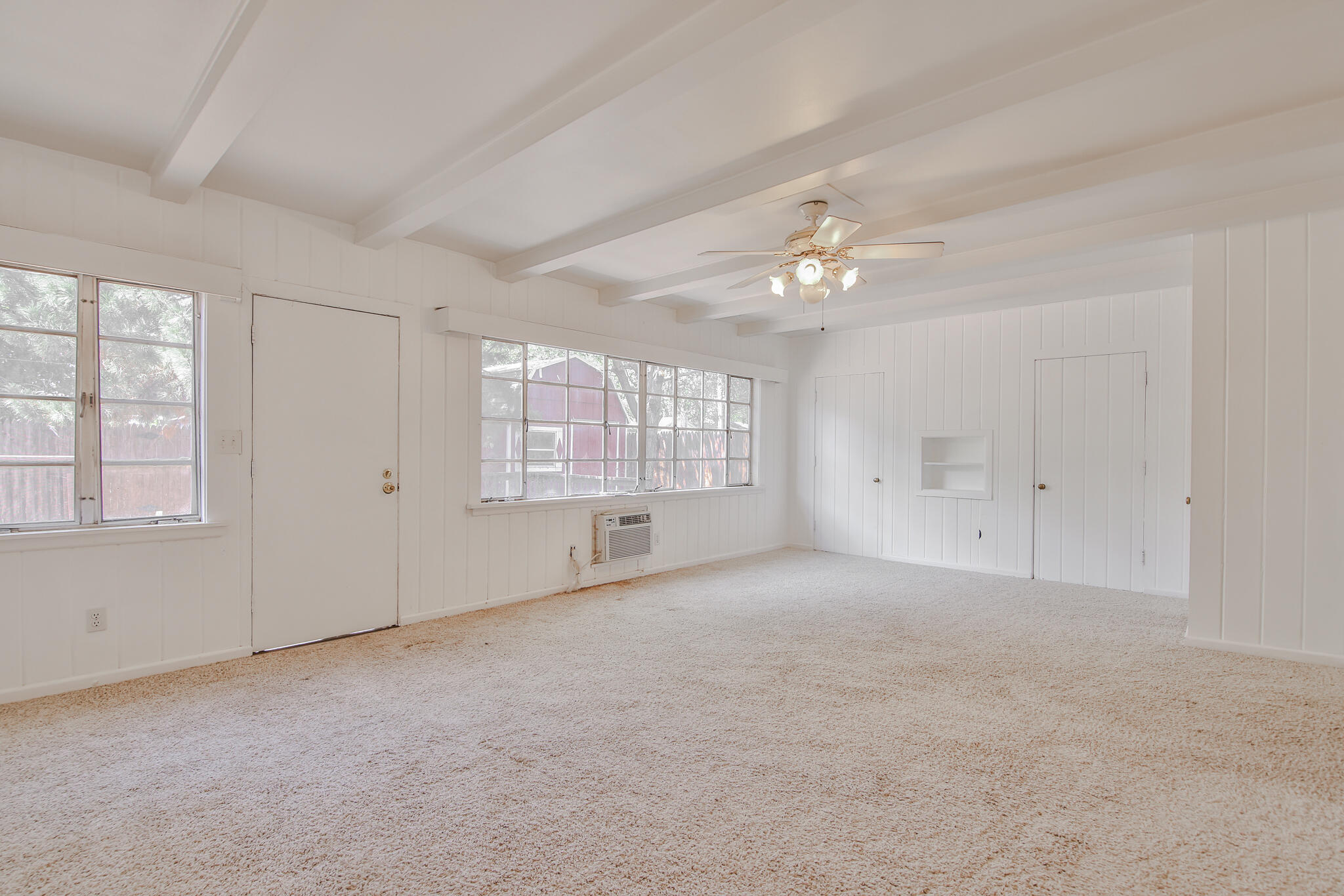 2715 29th Street Lubbock, TX 79410 - Photo 26 of 35 a view of an empty room with a window