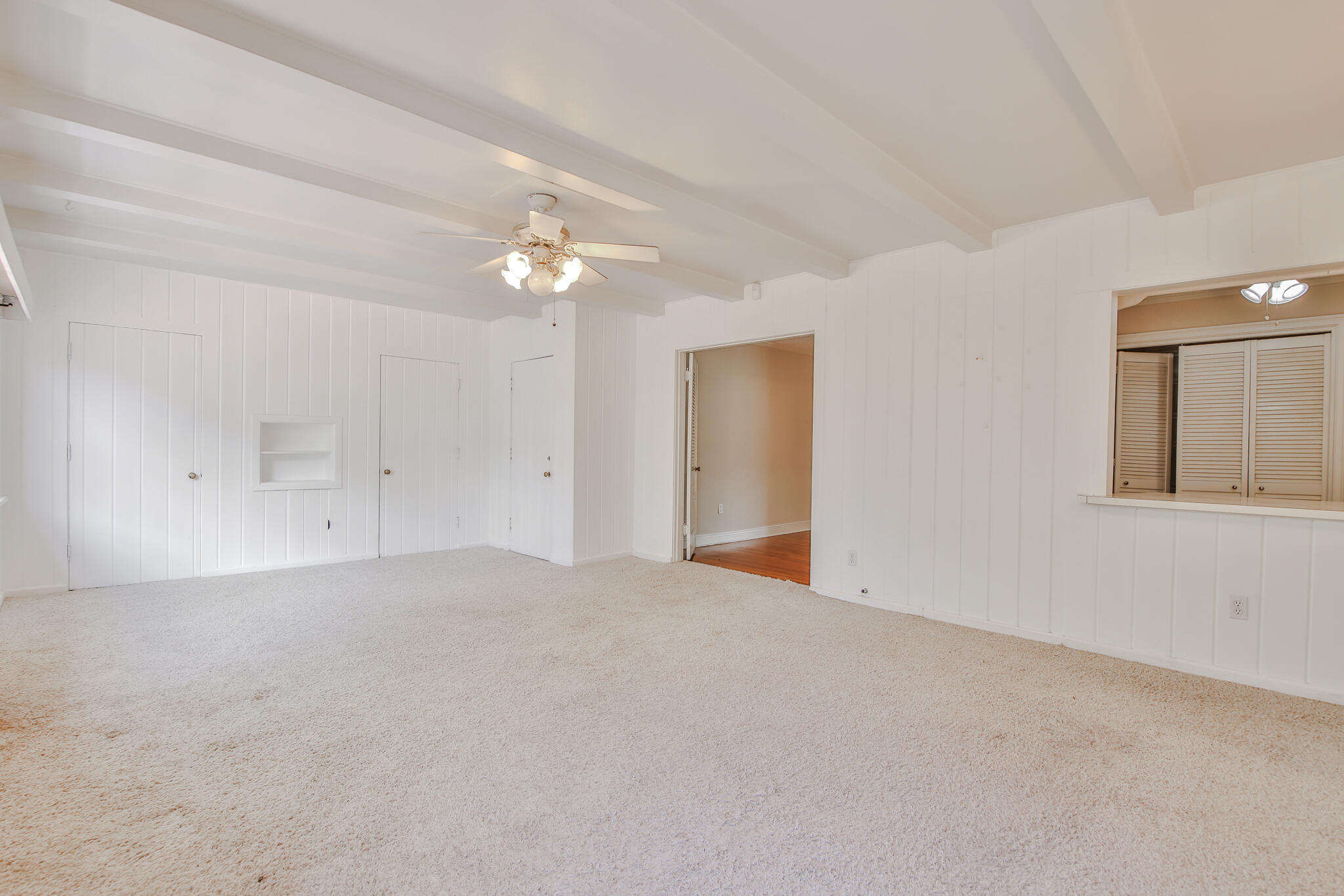 2715 29th Street Lubbock, TX 79410 - Photo 27 of 35 a view of an empty room with a chandelier fan