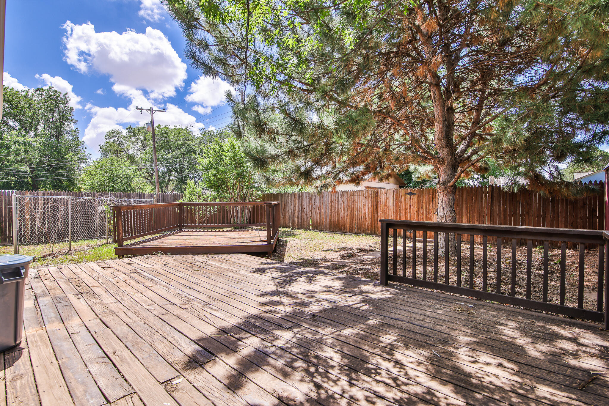 2715 29th Street Lubbock, TX 79410 - Photo 30 of 35 a view of backyard with wooden fence