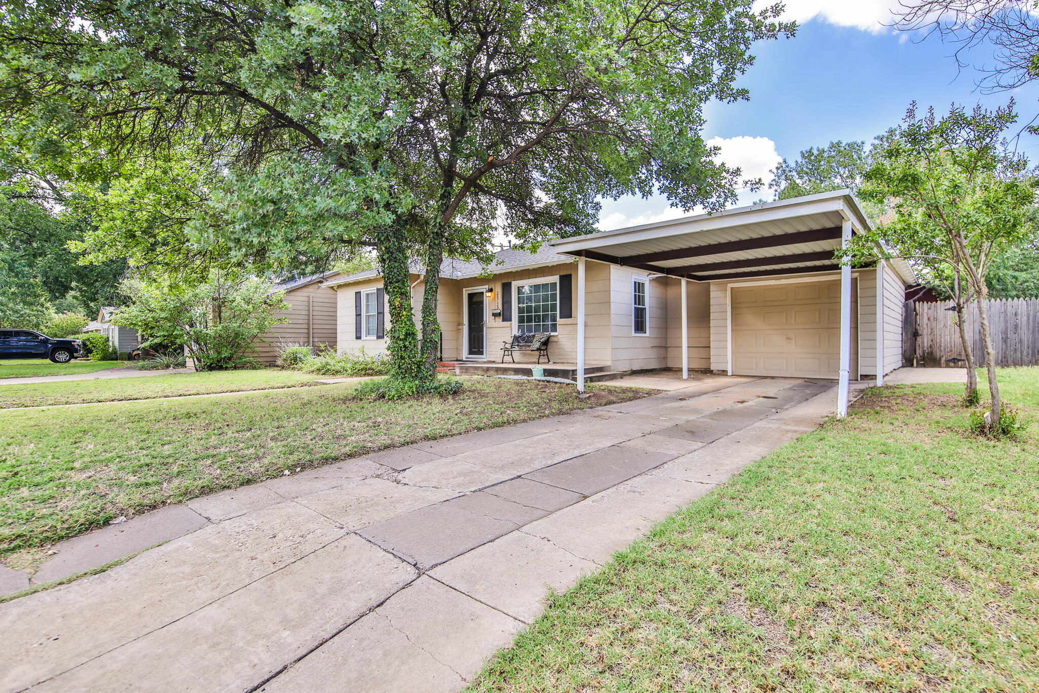 2715 29th Street Lubbock, TX 79410 - Photo 3 of 35 a front view of house with yard and green space
