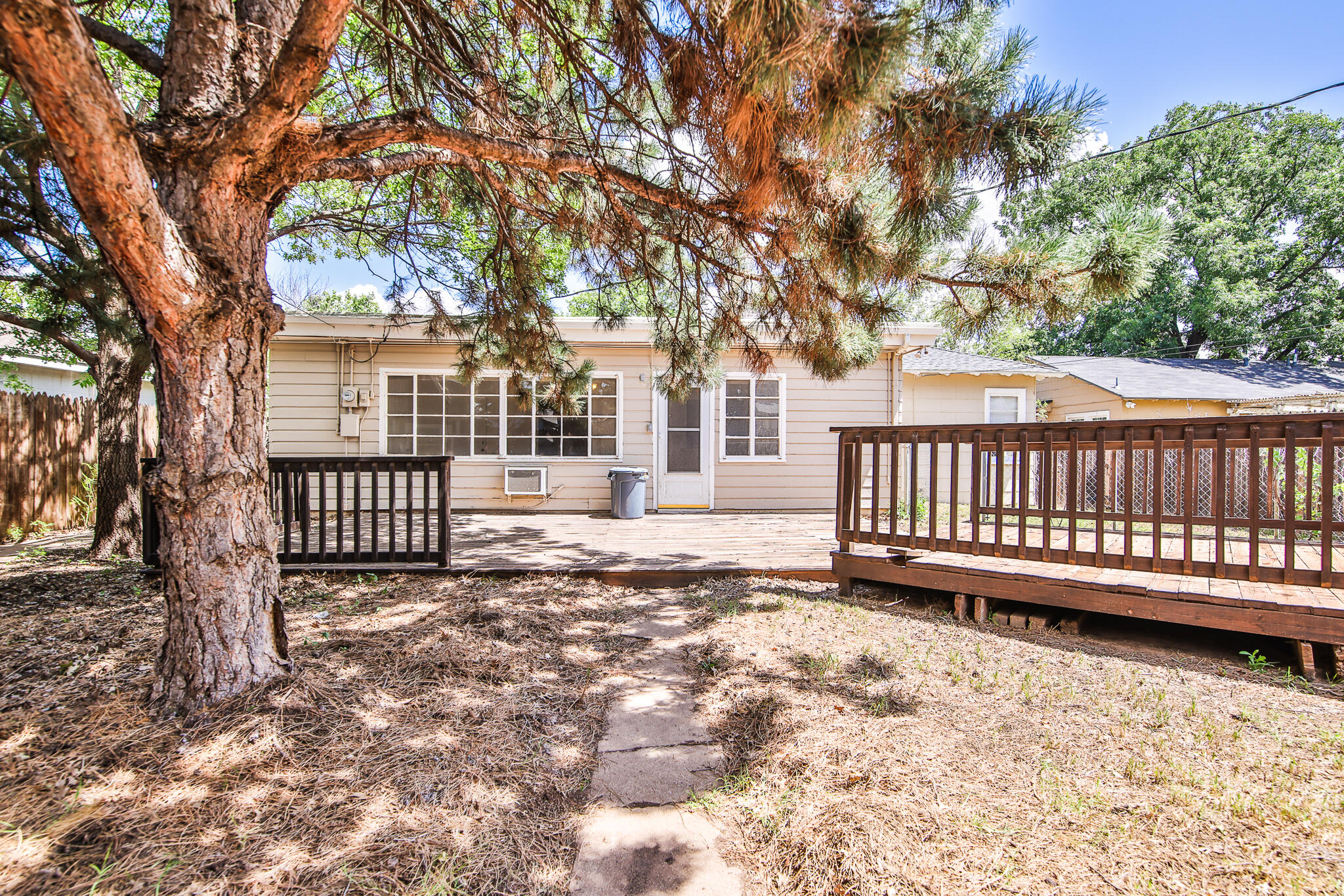 2715 29th Street Lubbock, TX 79410 - Photo 32 of 35 a view of a house with a yard