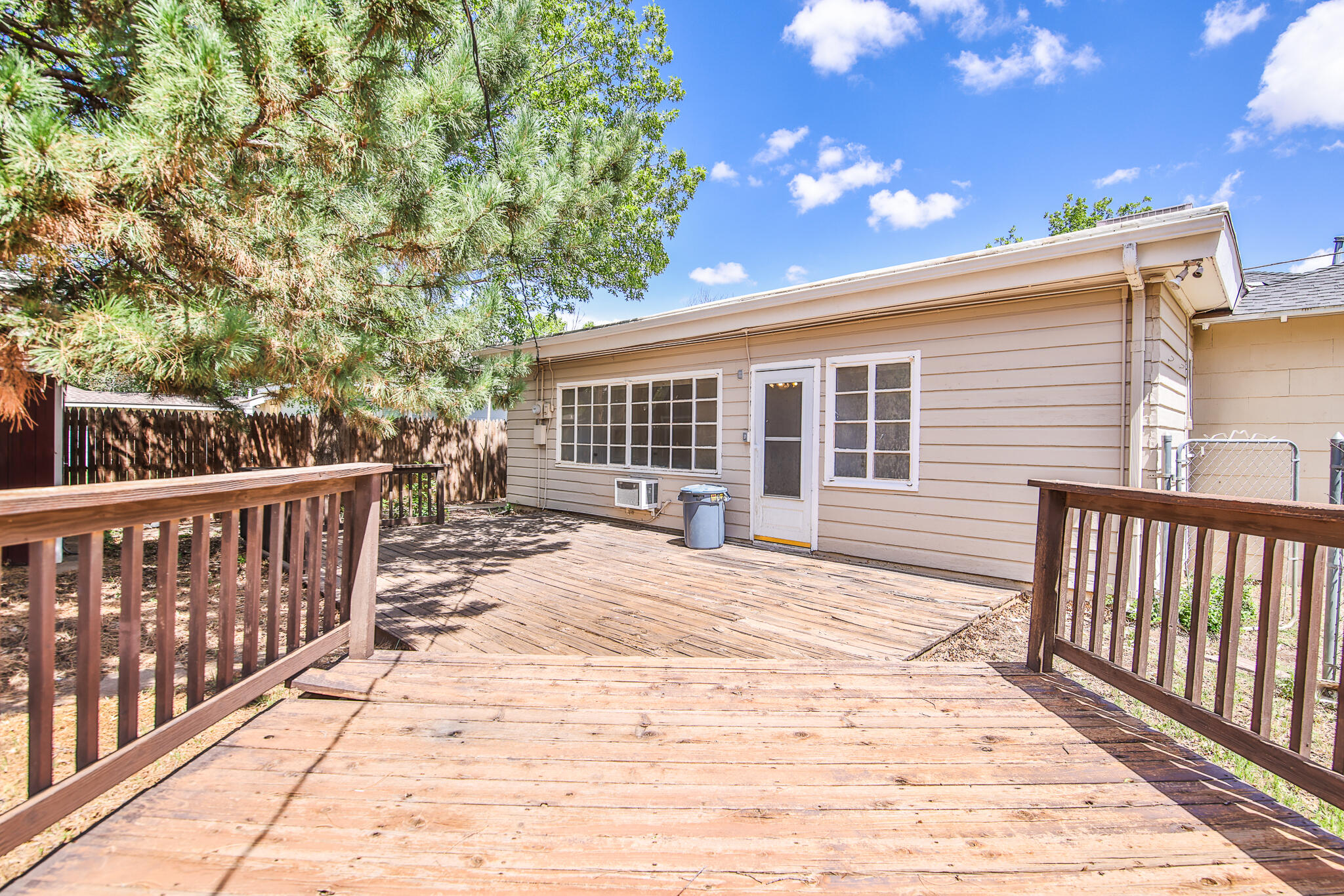 2715 29th Street Lubbock, TX 79410 - Photo 34 of 35 a view of a house with wooden deck