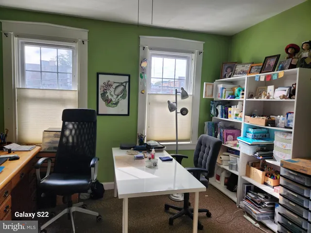 a view of a fountain in the backyard of a house with fountain