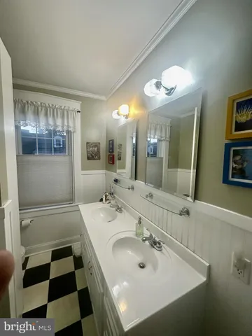 a kitchen with stainless steel appliances granite countertop a refrigerator and a stove