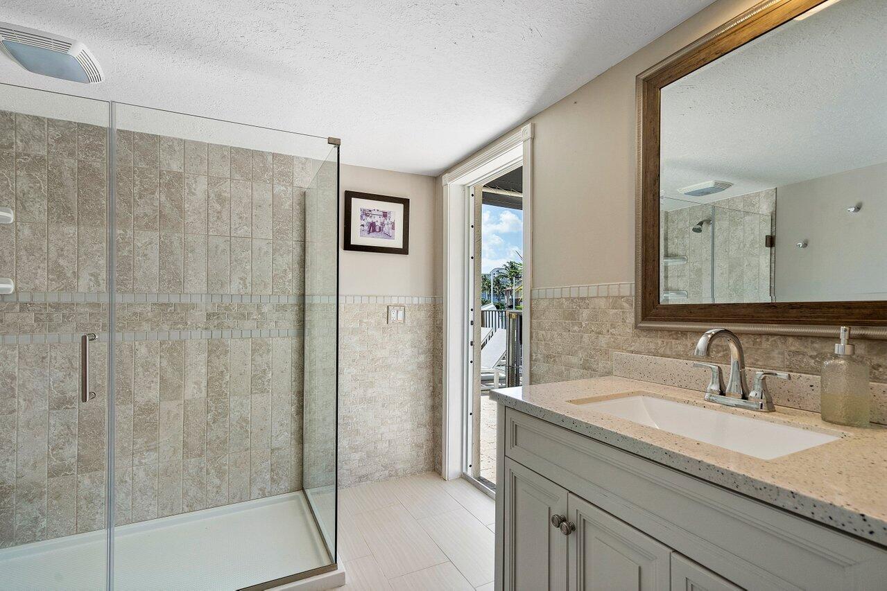 500 Commodore Circle Delray Beach, FL 33483 - Photo 20 of 57 UPDATED BATHS