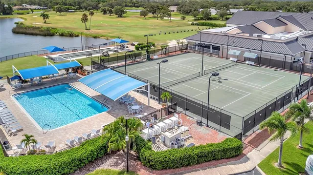 an aerial view of a house with a ocean view