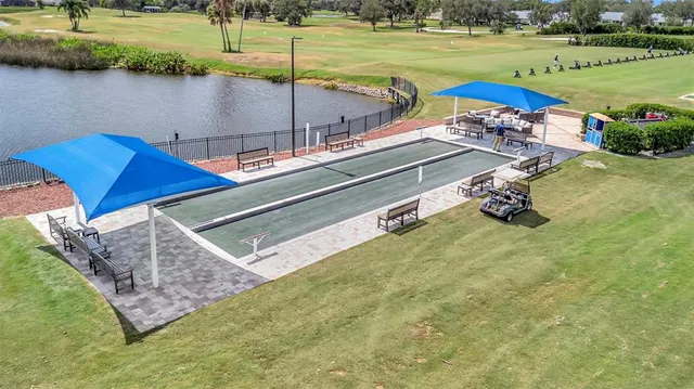 a view of a lake with a yard