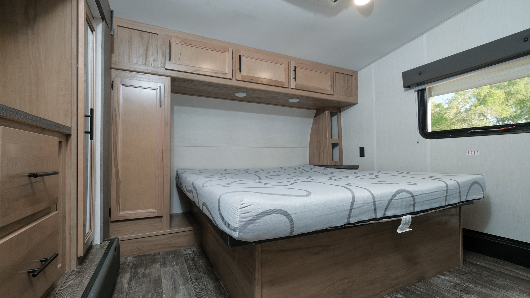 601 Pumpkin Ridge Road Dover, TN 37058 - Photo 39 of 50 a bedroom with a bed and wooden floor