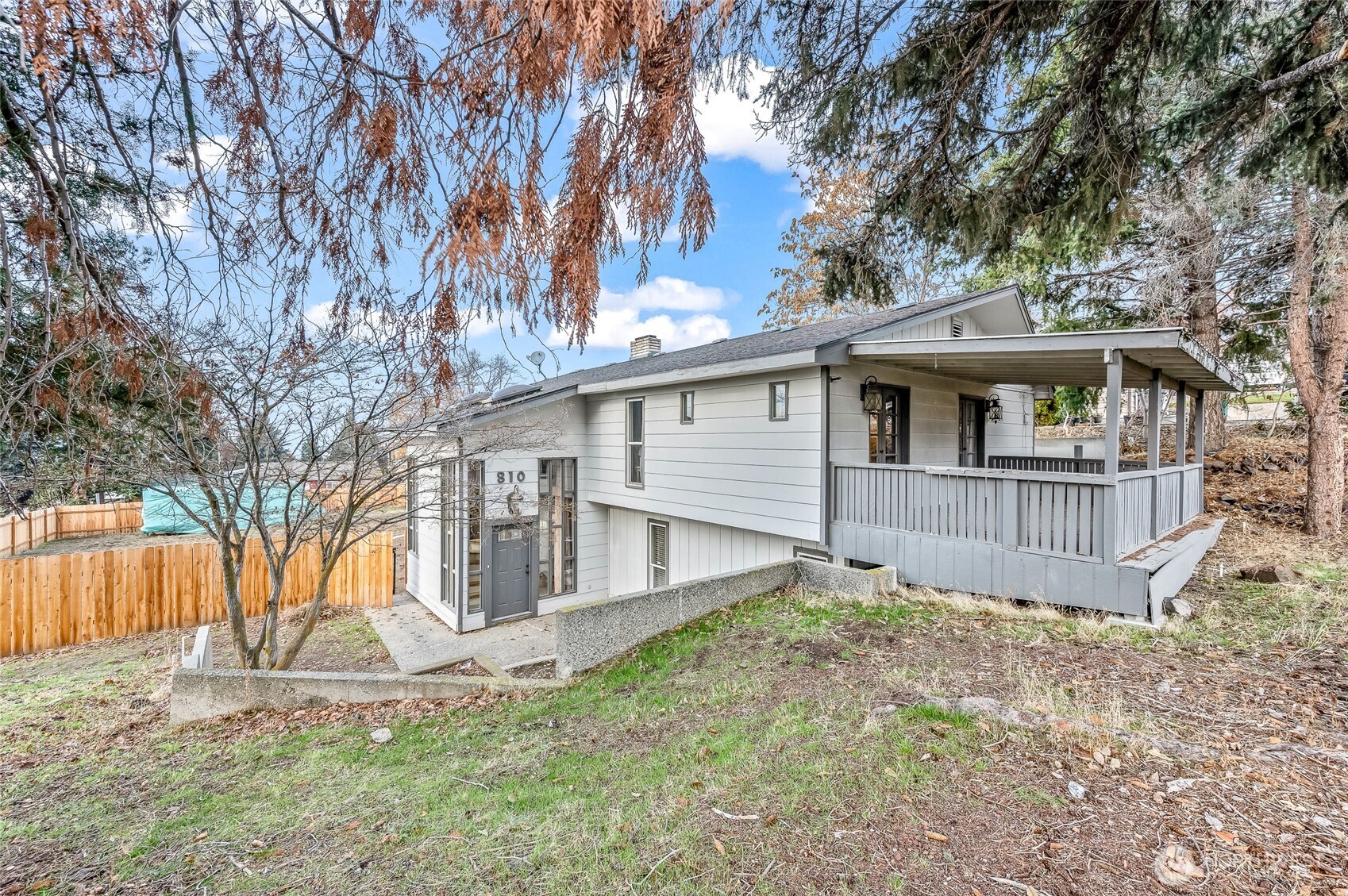 809 North Kenroy Terrace East Wenatchee, WA 98802 - Photo 2 of 33 a view of a house with a yard and large tree