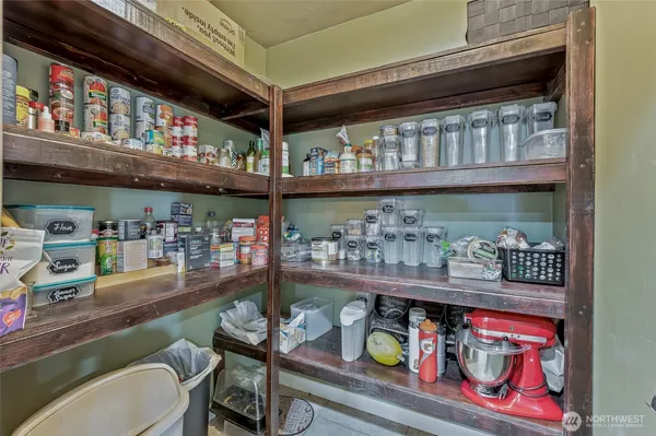 a room with wooden shelves