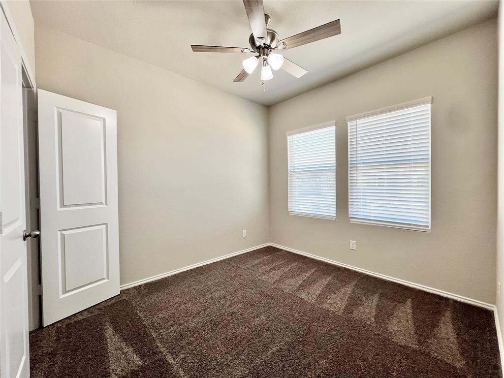 3501 East Renfro Street, Unit 201 Burleson, TX 76028 - Photo 22 of 33 a view of an empty room with a window