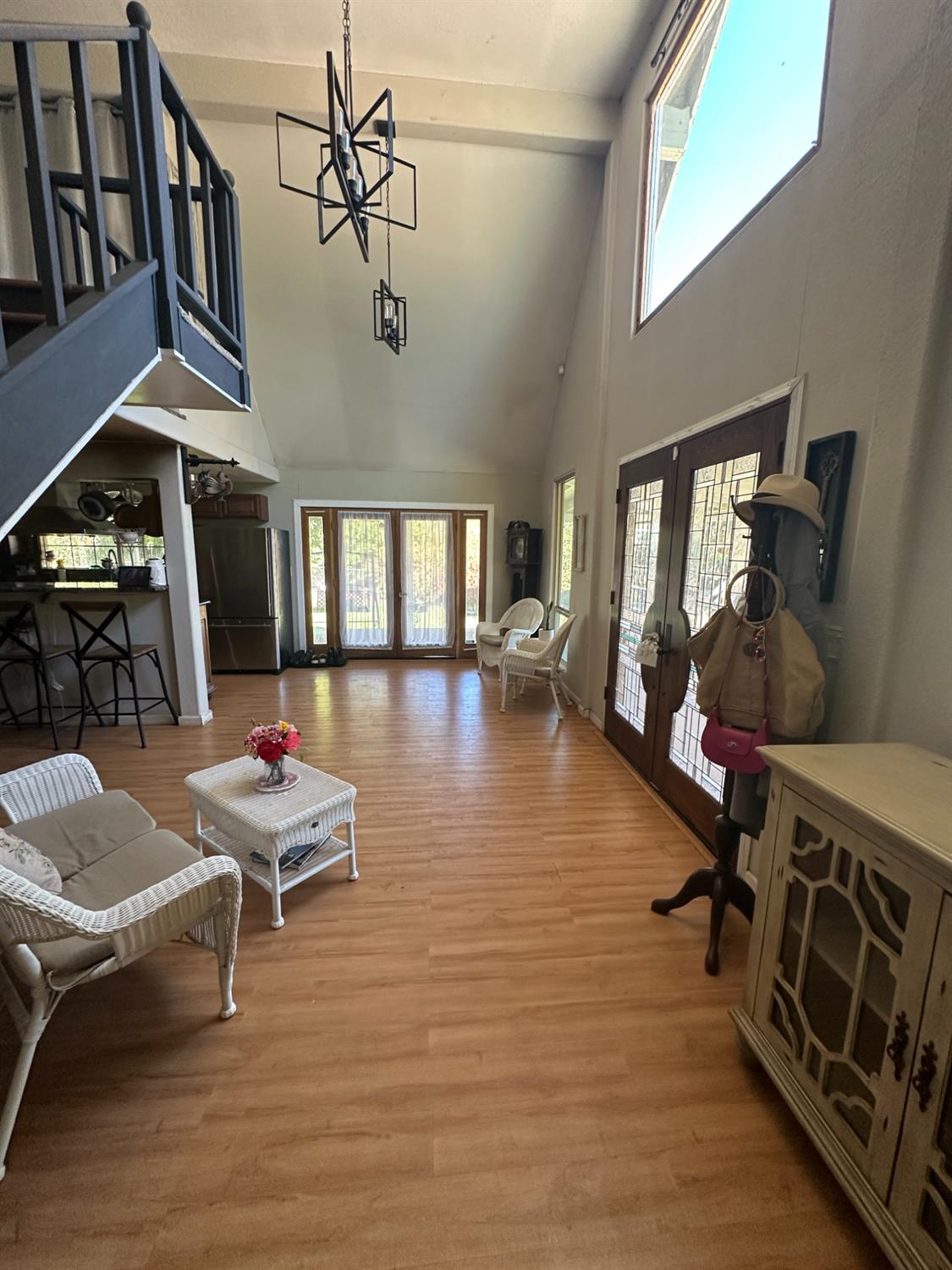 777 West Brannan Island Road Isleton, CA 95641 - Photo 6 of 24 a room with lots of wooden furniture and windows