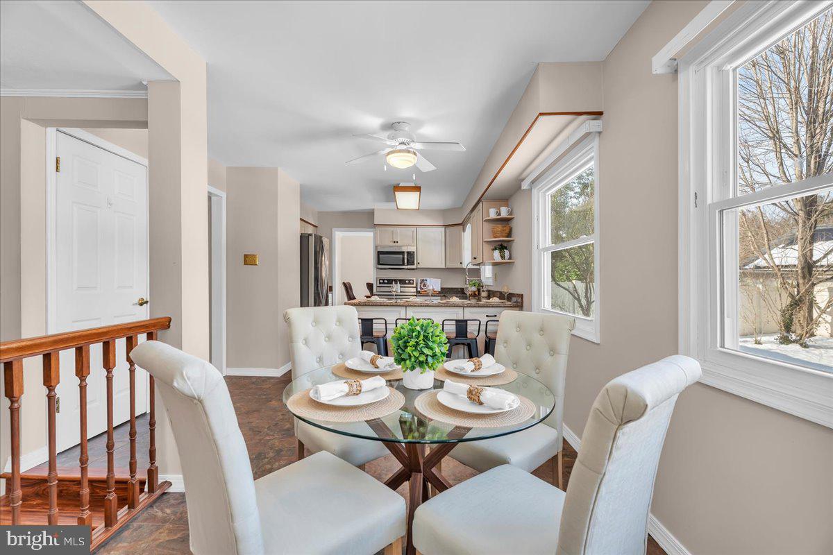 517 Perry Drive Mount Laurel, NJ 08054 - Photo 11 of 41 a view of a dining room with furniture window and outside view