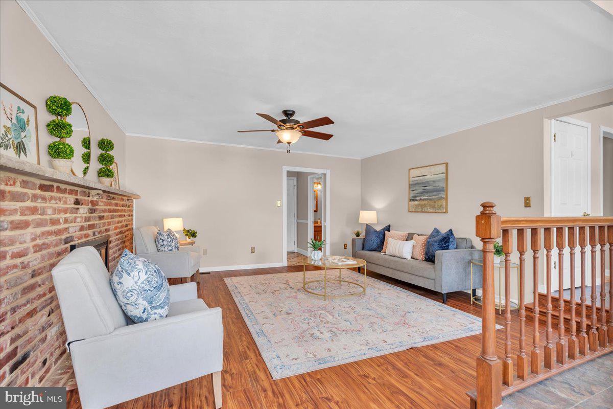 517 Perry Drive Mount Laurel, NJ 08054 - Photo 15 of 41 a living room with furniture and a fireplace