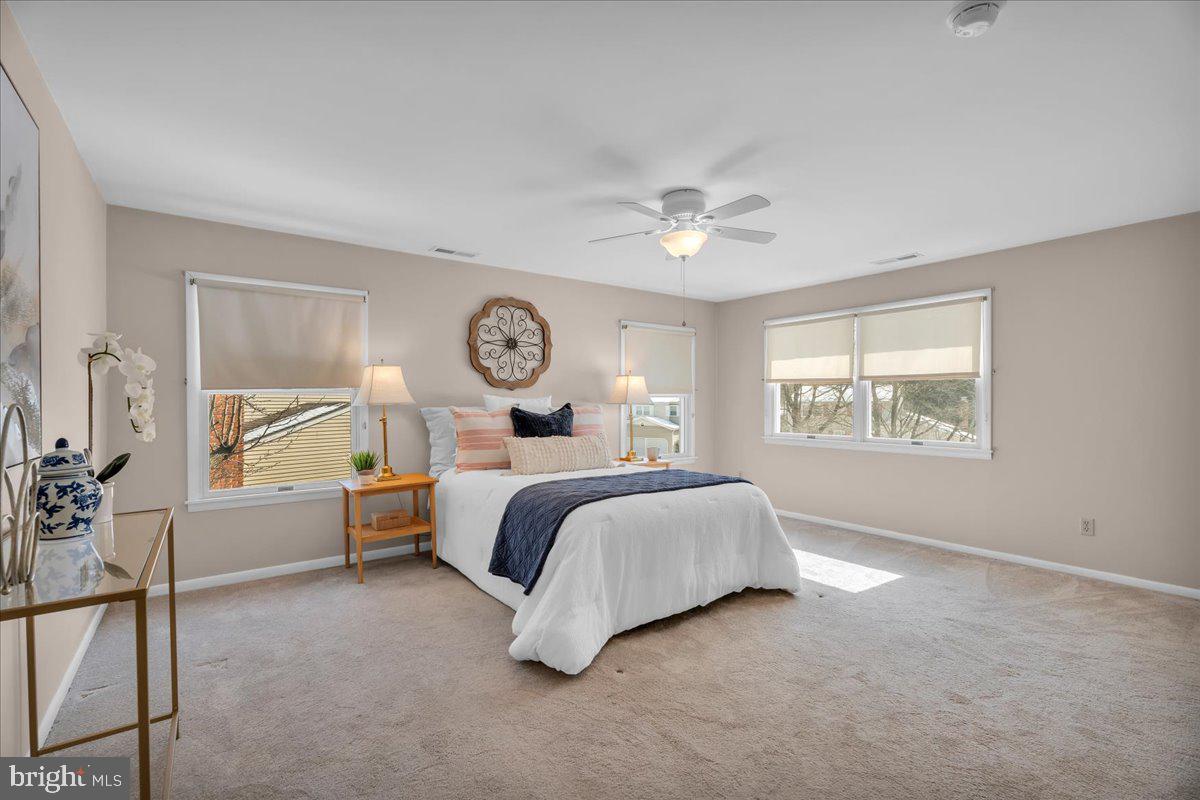 517 Perry Drive Mount Laurel, NJ 08054 - Photo 19 of 41 a spacious bedroom with a bed and window