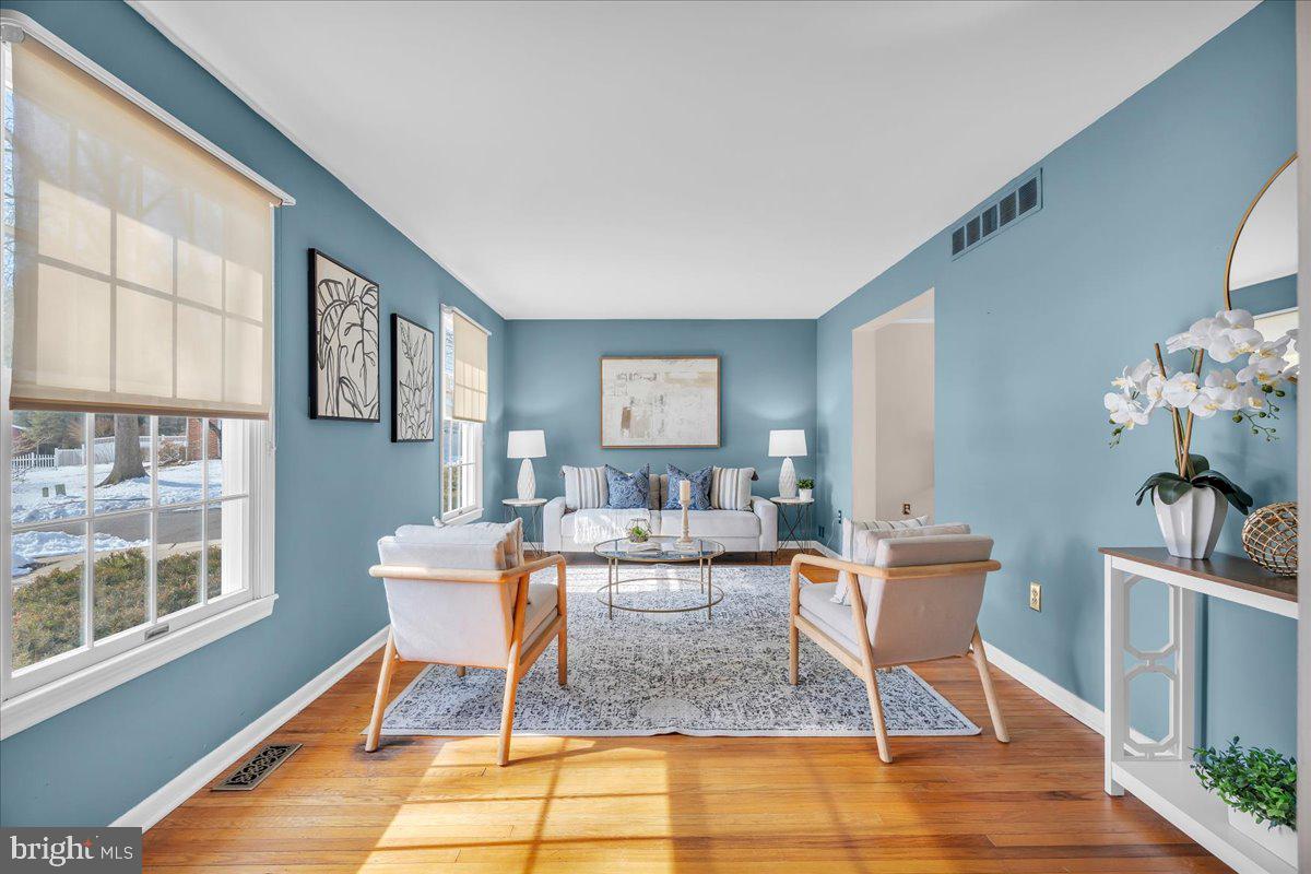 517 Perry Drive Mount Laurel, NJ 08054 - Photo 2 of 41 a dining room with furniture a rug and wooden floor