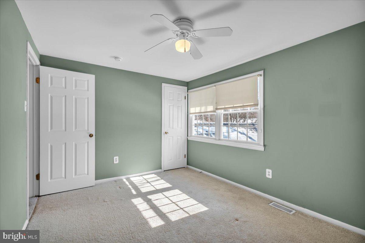 517 Perry Drive Mount Laurel, NJ 08054 - Photo 23 of 41 a view of an empty room with a window