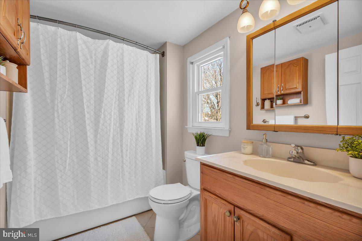 517 Perry Drive Mount Laurel, NJ 08054 - Photo 24 of 41 a bathroom with a granite countertop sink and a mirror