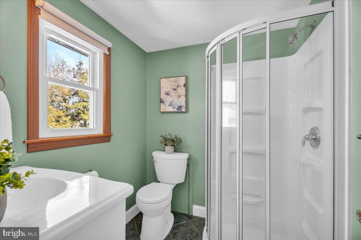 517 Perry Drive Mount Laurel, NJ 08054 - Photo 28 of 41 a bathroom with a toilet sink and shower