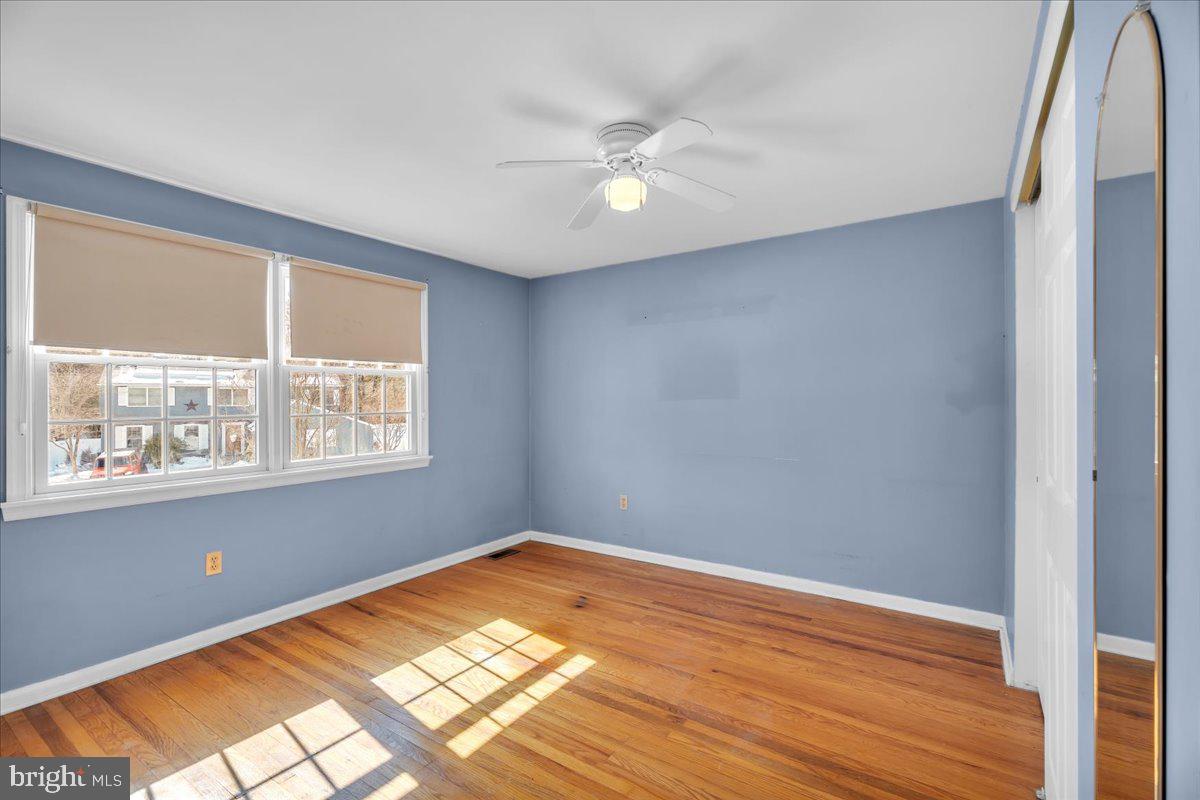517 Perry Drive Mount Laurel, NJ 08054 - Photo 29 of 41 a view of wooden floor and windows in a room