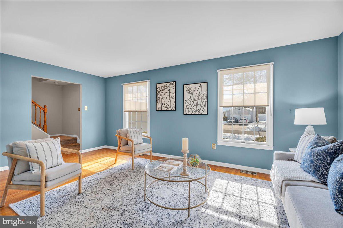 517 Perry Drive Mount Laurel, NJ 08054 - Photo 3 of 41 a living room with furniture a rug and a window