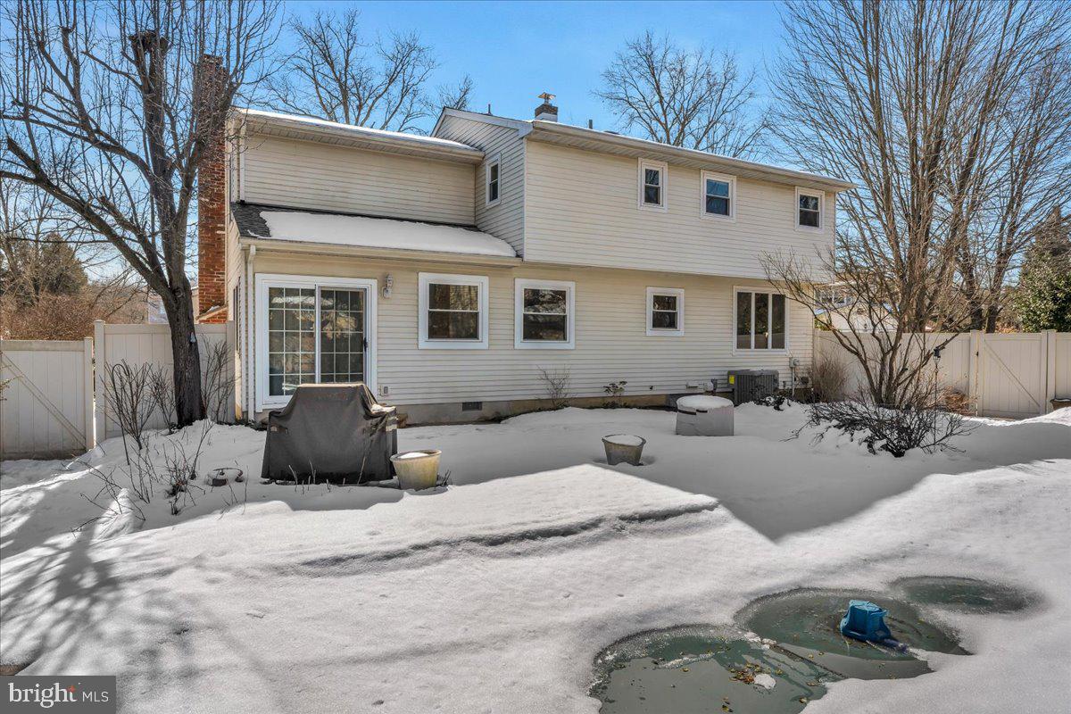 517 Perry Drive Mount Laurel, NJ 08054 - Photo 36 of 41 a view of a house with a yard covered in snow