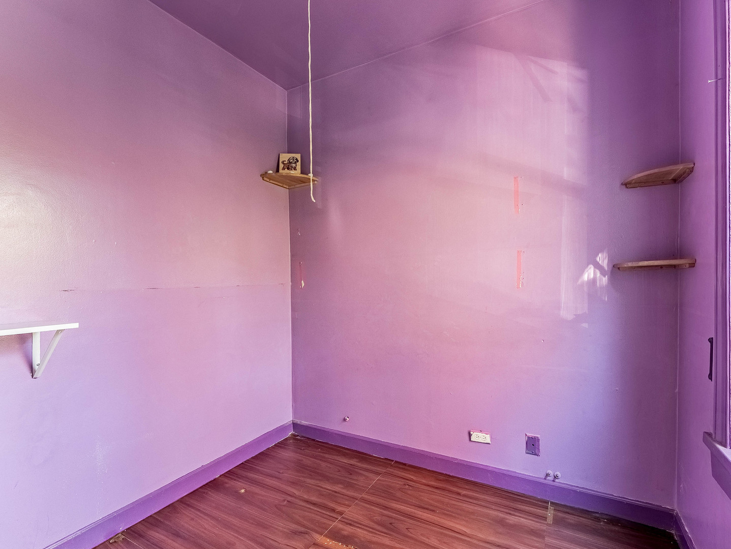3244 North Drake Avenue Chicago, IL 60618 - Photo 5 of 37 a view of a room with wooden floor and a shower