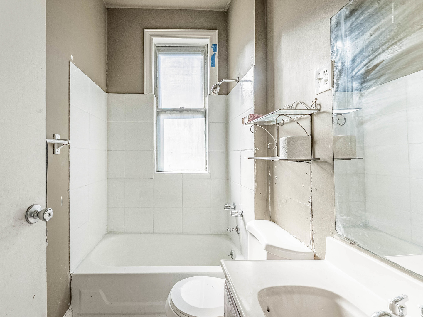 3244 North Drake Avenue Chicago, IL 60618 - Photo 7 of 37 a bathroom with a sink toilet and shower
