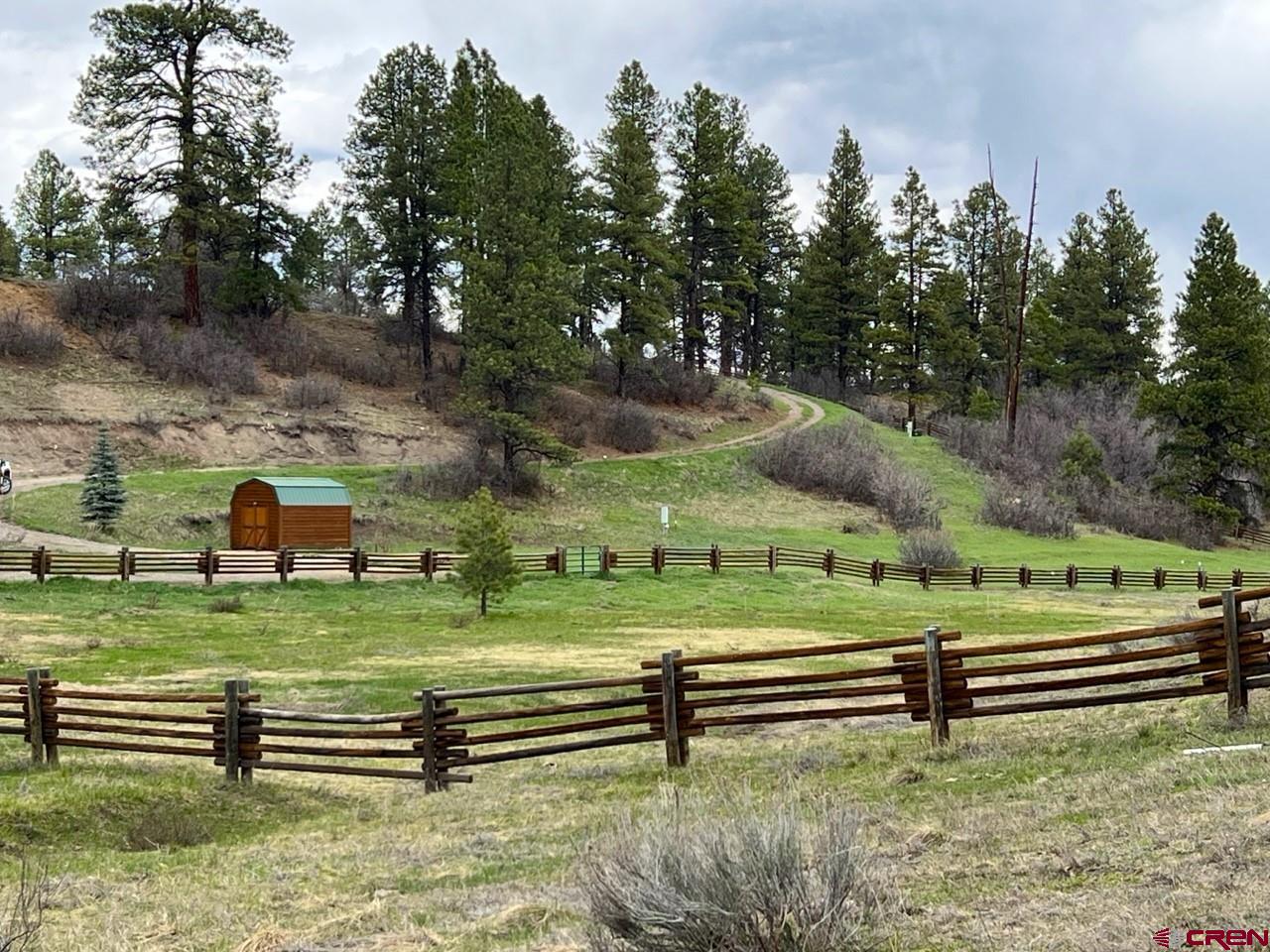 Lot 2 Spring Valley Ranch Road Chromo, CO 81128 - Photo 13 of 35 a backyard of a house with a yard and green space