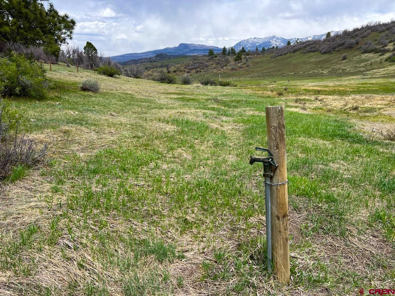 Lot 2 Spring Valley Ranch Road Chromo, CO 81128 - Photo 22 of 35 a view of a lake with a mountain in the background