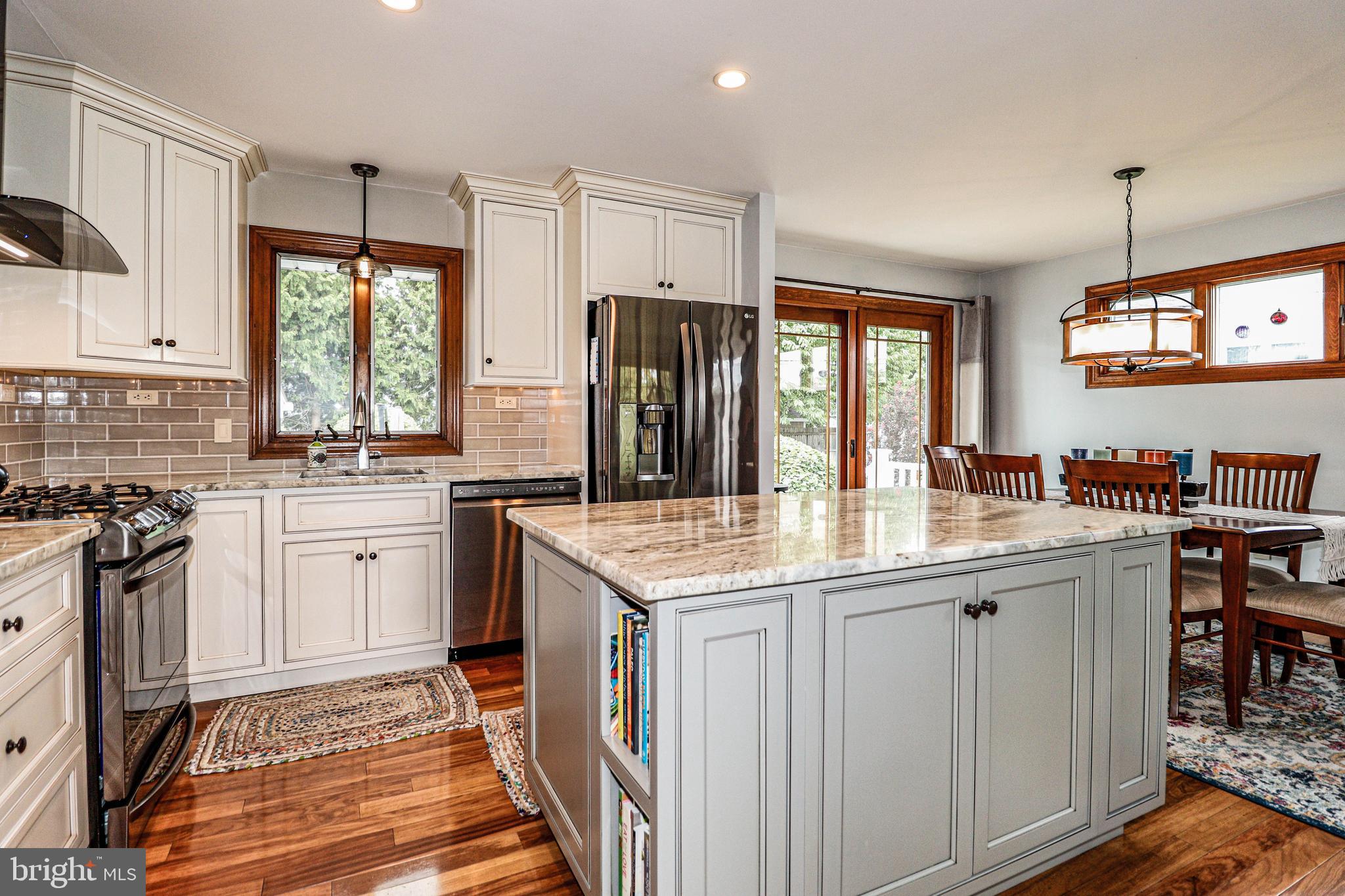 94 Winding Way Hamilton, NJ 08620 - Photo 12 of 38 a kitchen with a sink stove and refrigerator