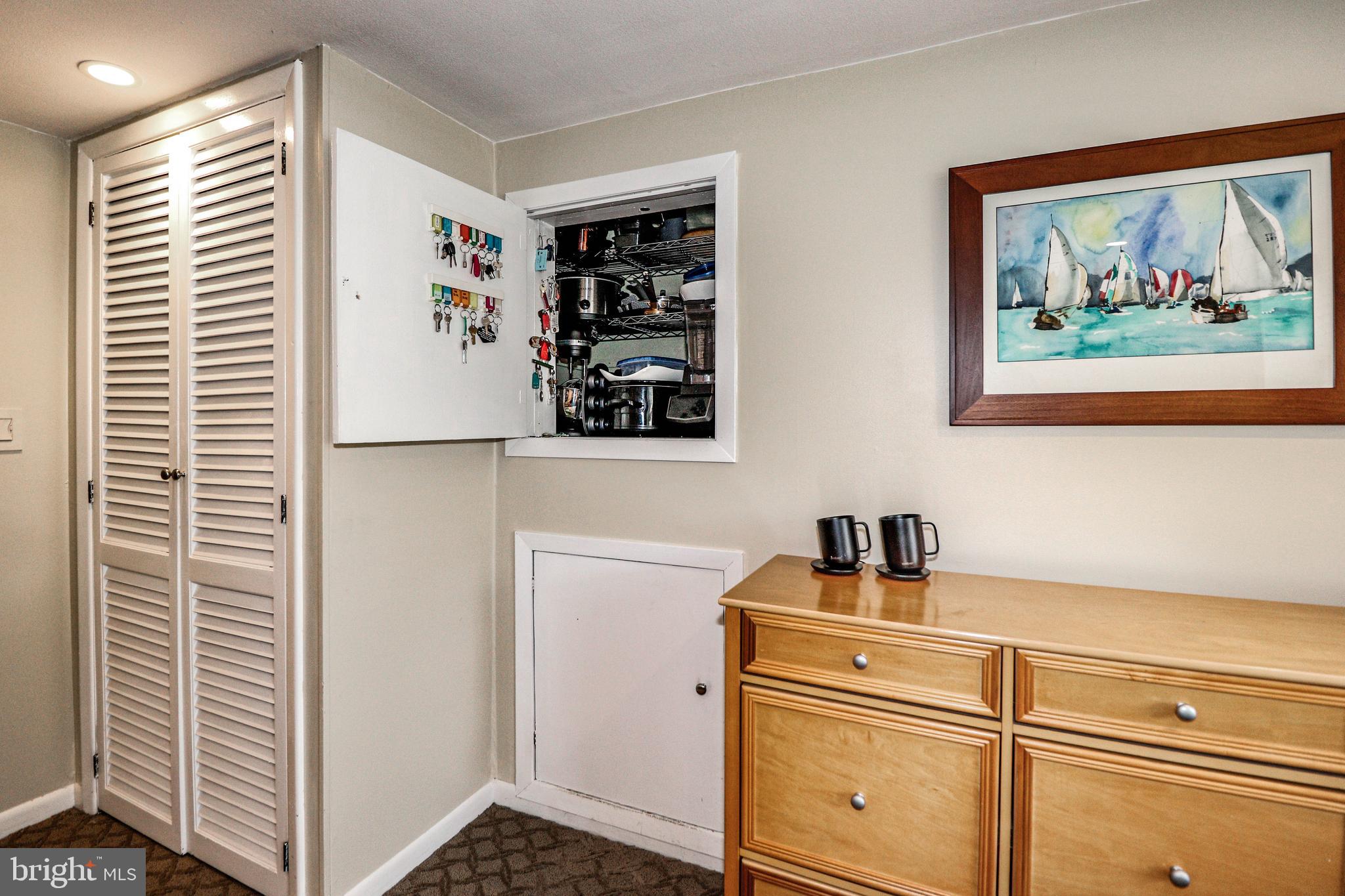 94 Winding Way Hamilton, NJ 08620 - Photo 16 of 38 a view of a kitchen with fridge and wooden floor