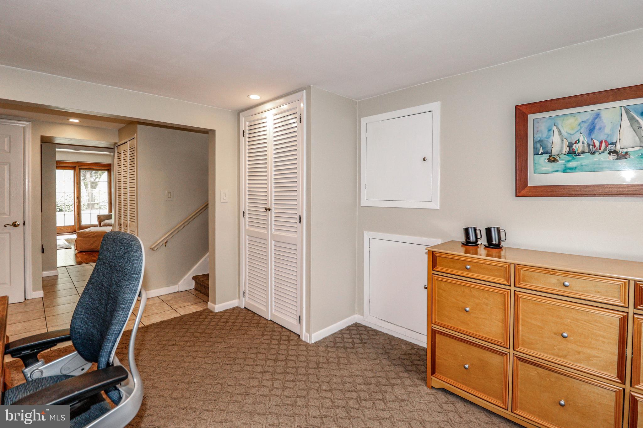 94 Winding Way Hamilton, NJ 08620 - Photo 17 of 38 a view of a workspace with furniture and a window
