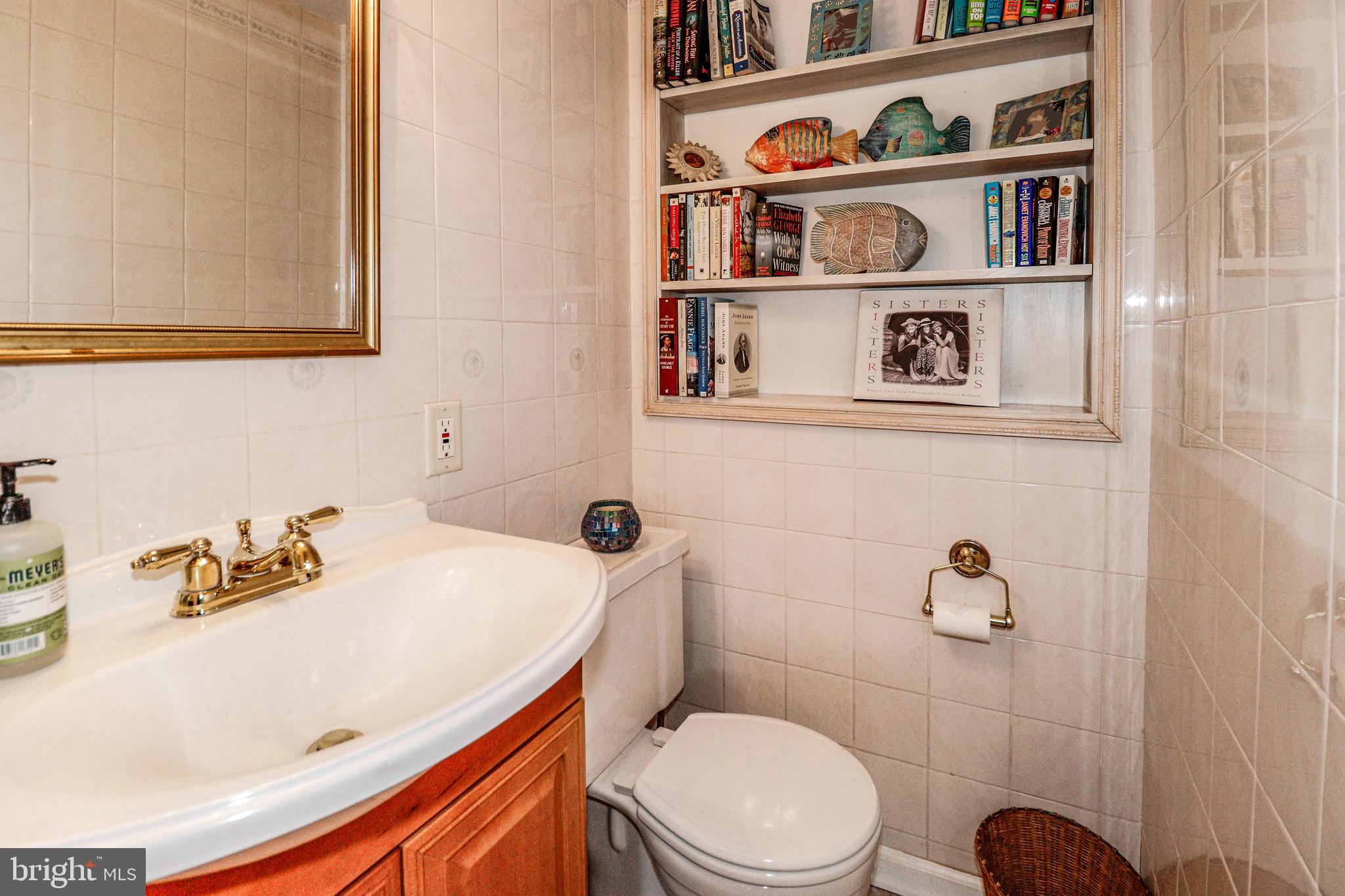 94 Winding Way Hamilton, NJ 08620 - Photo 18 of 38 a bathroom with a sink a toilet and a shower
