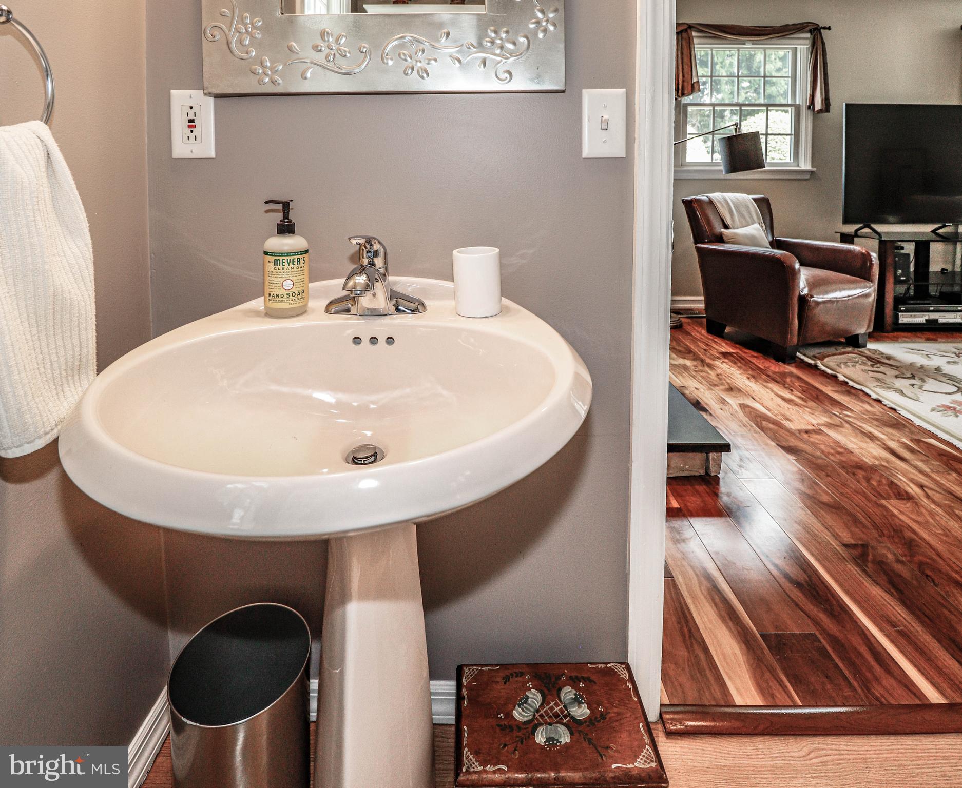 94 Winding Way Hamilton, NJ 08620 - Photo 23 of 38 a en suite bathroom with a sink and a mirror