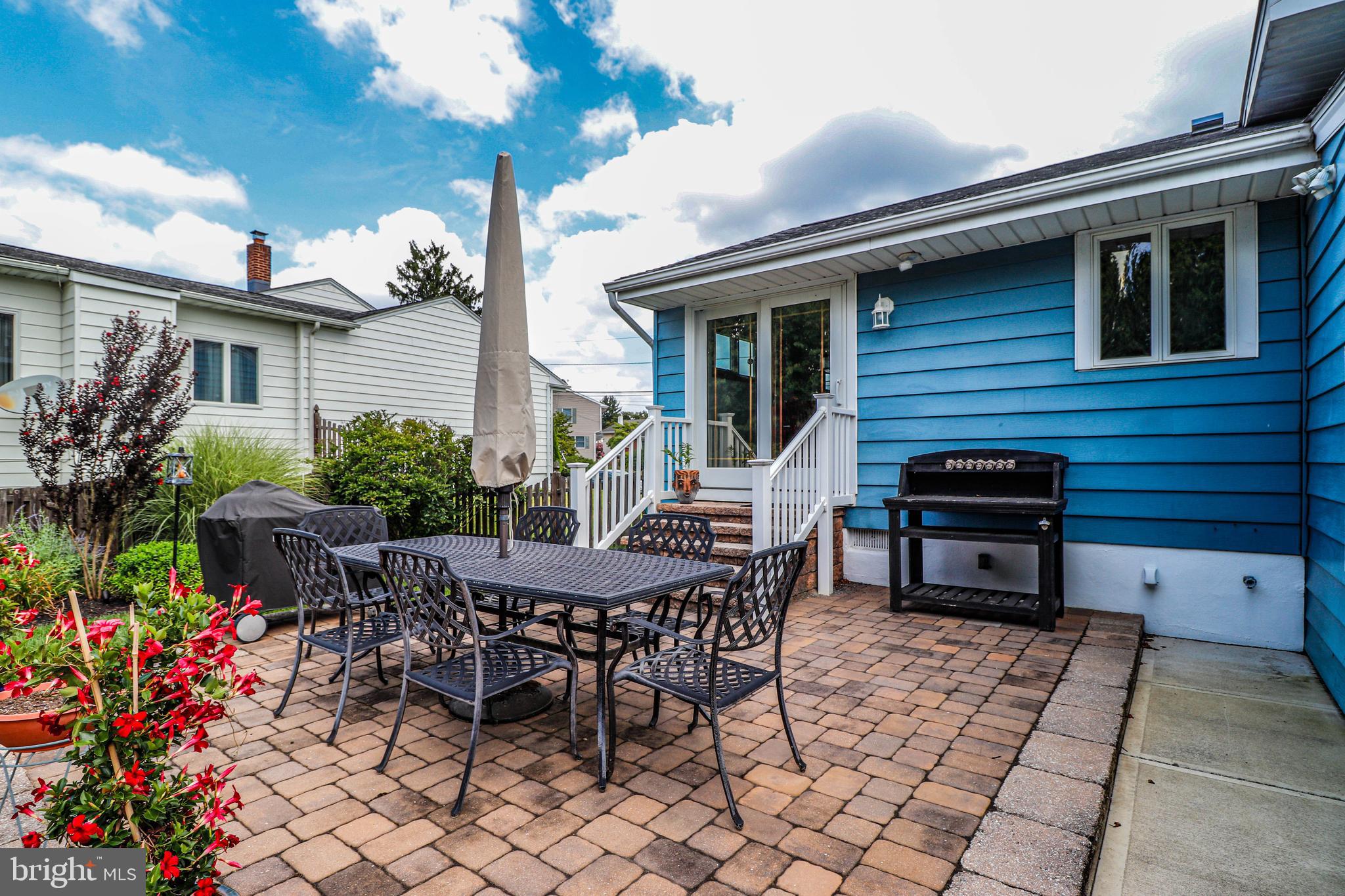 94 Winding Way Hamilton, NJ 08620 - Photo 35 of 38 a view of a house with backyard and sitting area