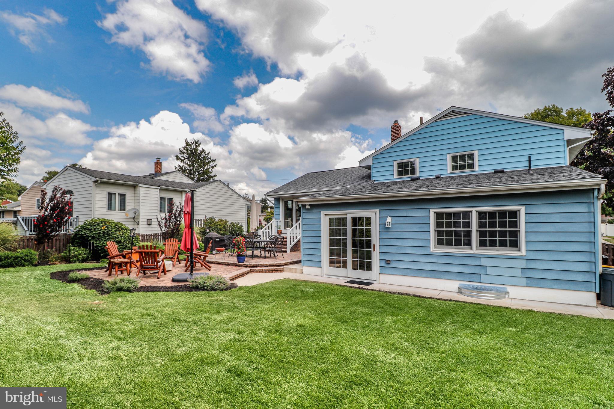 94 Winding Way Hamilton, NJ 08620 - Photo 37 of 38 a front view of a house with a yard