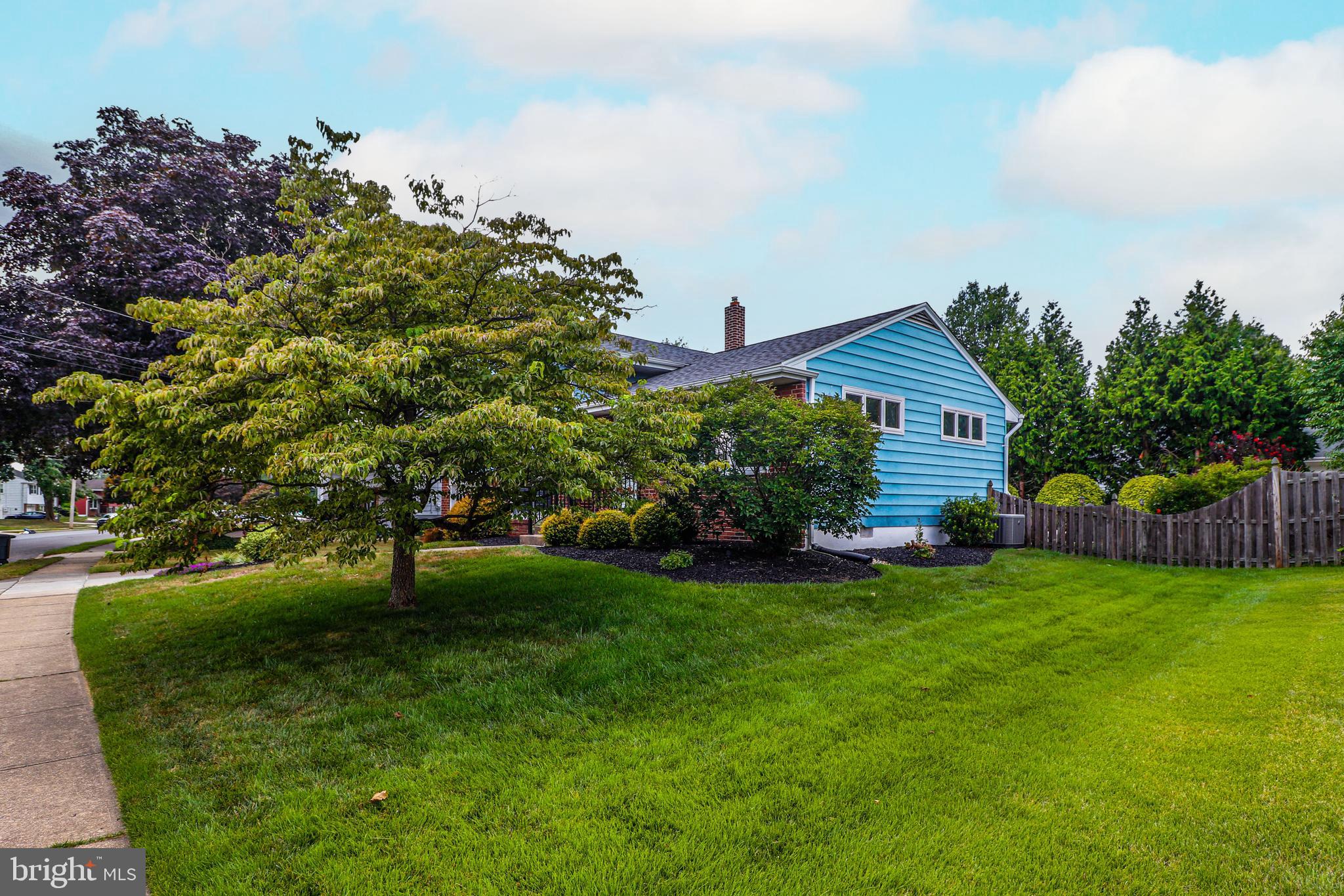 94 Winding Way Hamilton, NJ 08620 - Photo 4 of 38 a view of a house with a yard
