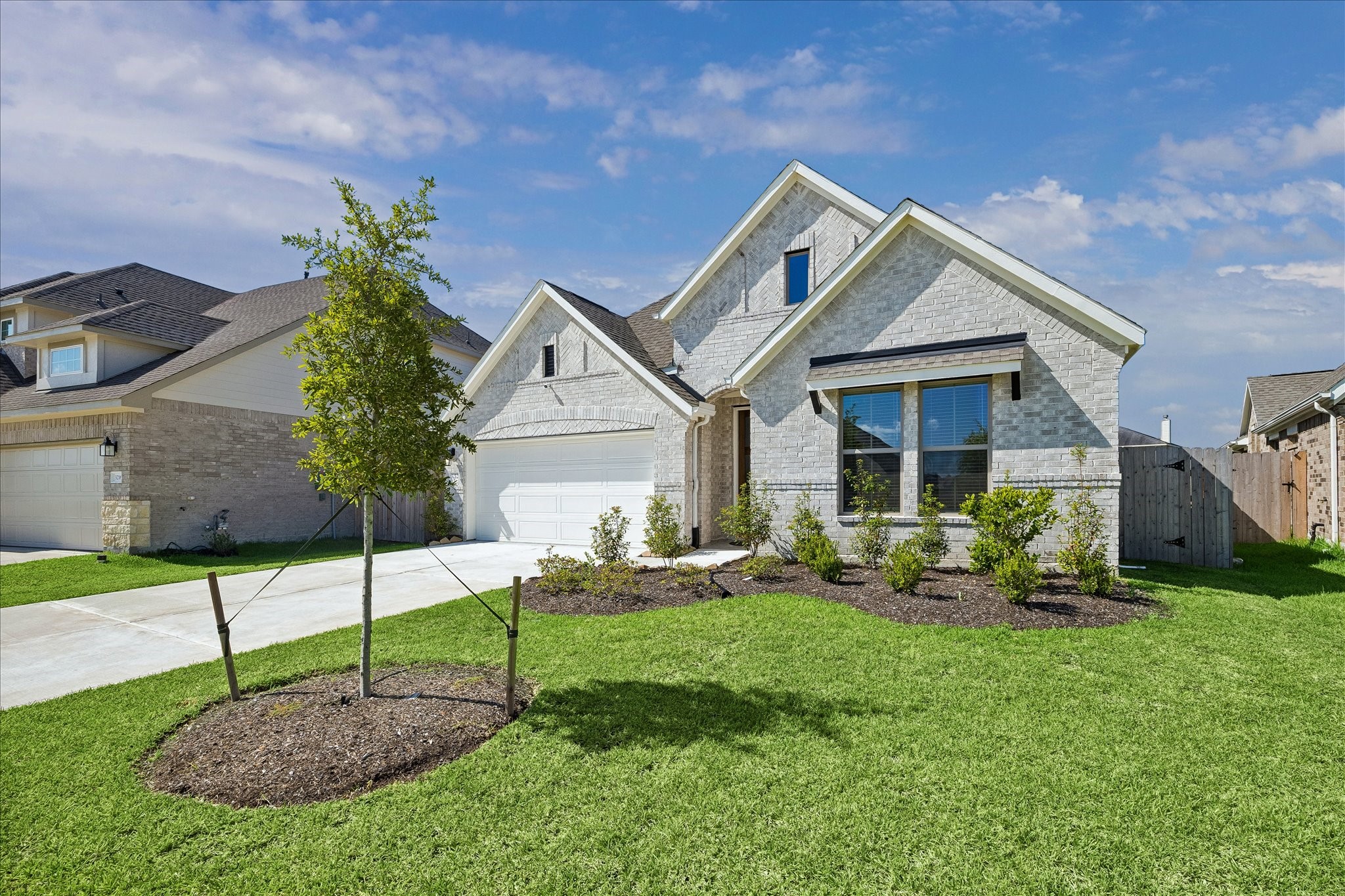 3212 Bright Maple Dr Spring Spring, TX 77386 - Photo 2 of 28 The all brick exterior of this home welcomes you in to the Energy Star Qualified Home. Come on in, the house is much larger inside than it appears.