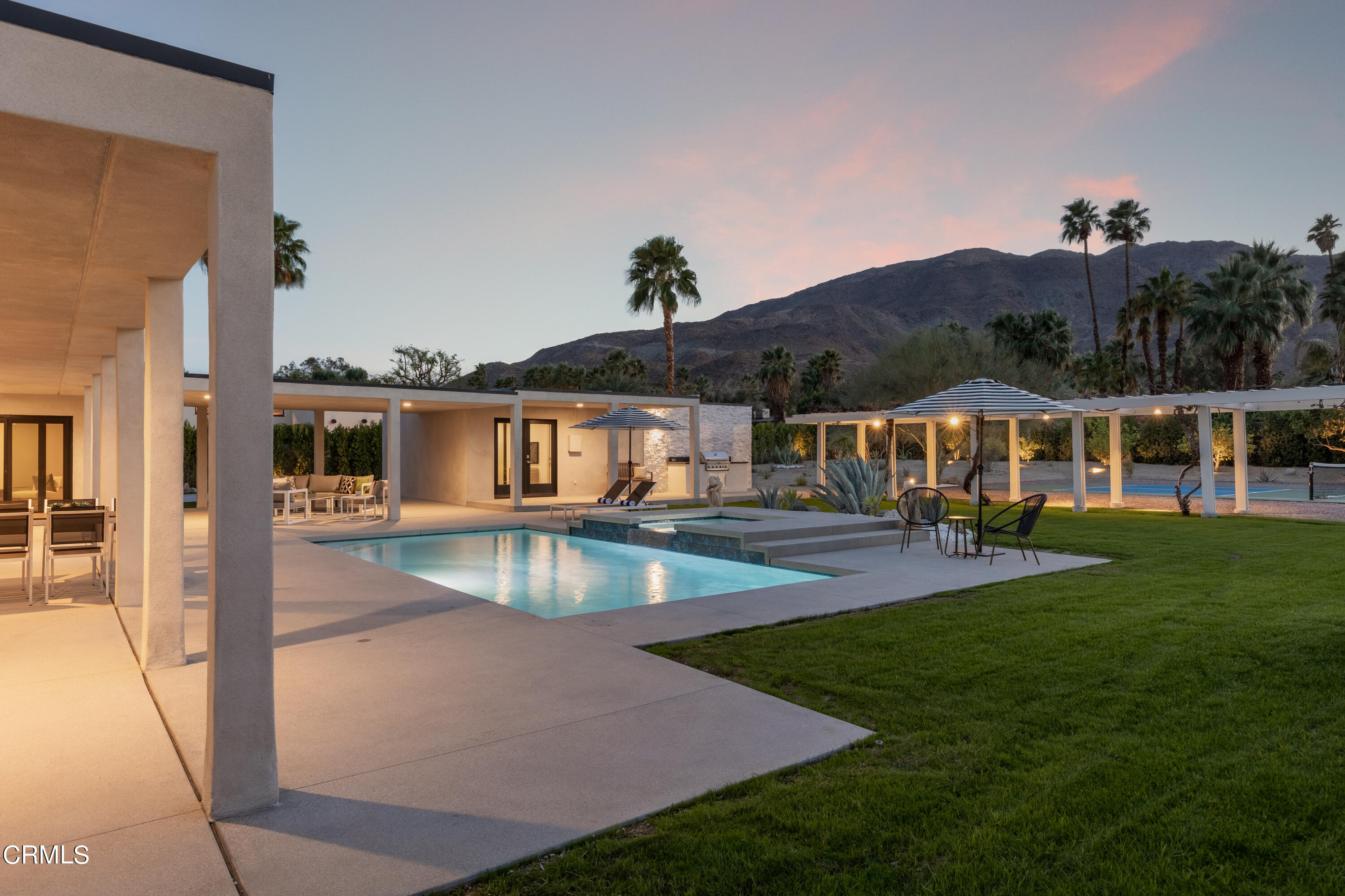 71817 Sahara Road Rancho Mirage, CA 92270 - Photo 1 of 25 a view of house with swimming pool yard and outdoor seating