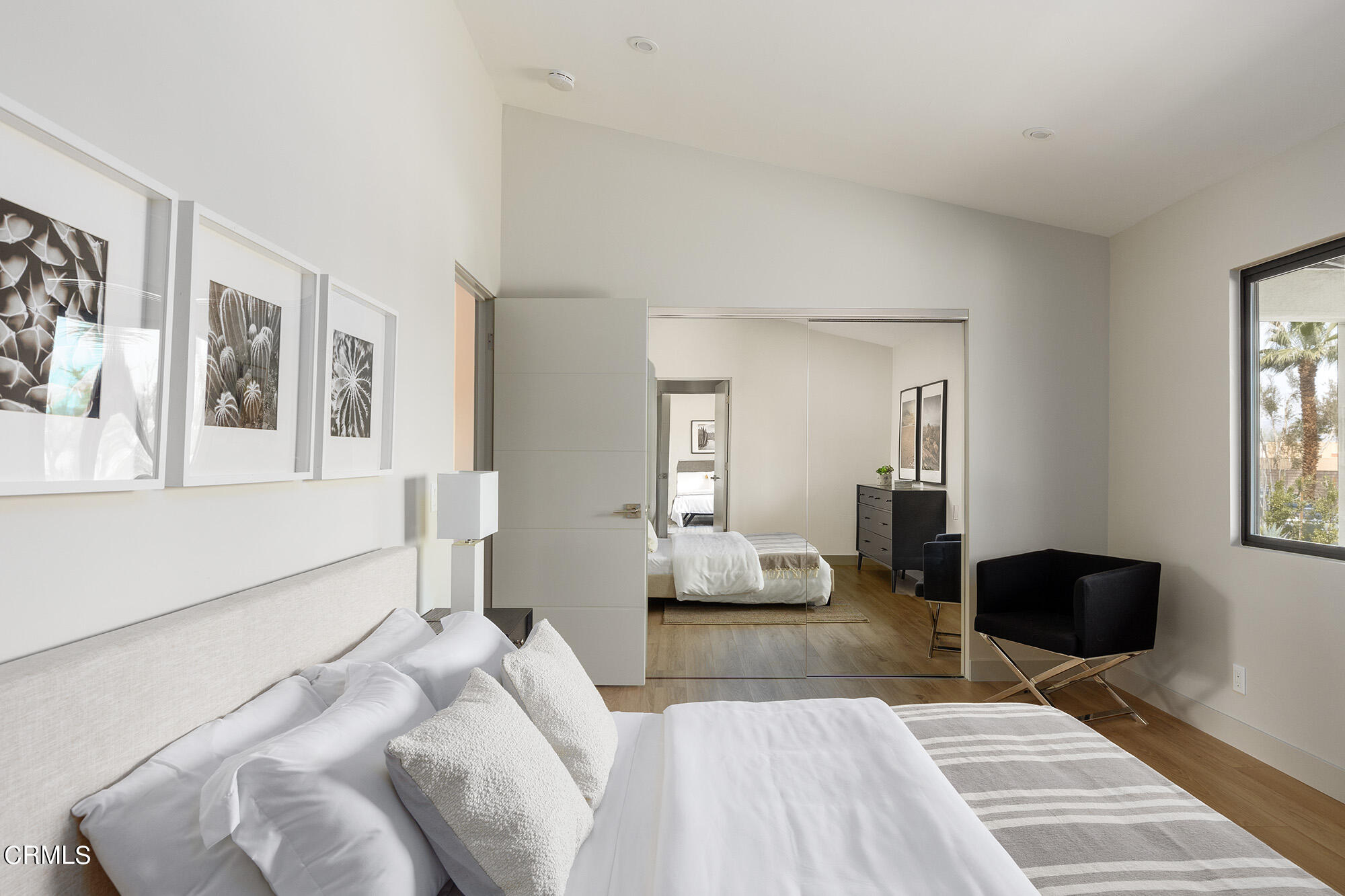 71817 Sahara Road Rancho Mirage, CA 92270 - Photo 12 of 25 a bedroom with a bed and wooden floor