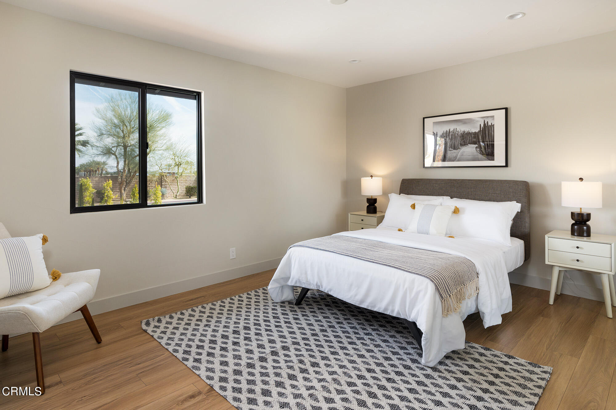 71817 Sahara Road Rancho Mirage, CA 92270 - Photo 13 of 25 a bedroom with a bed and a window