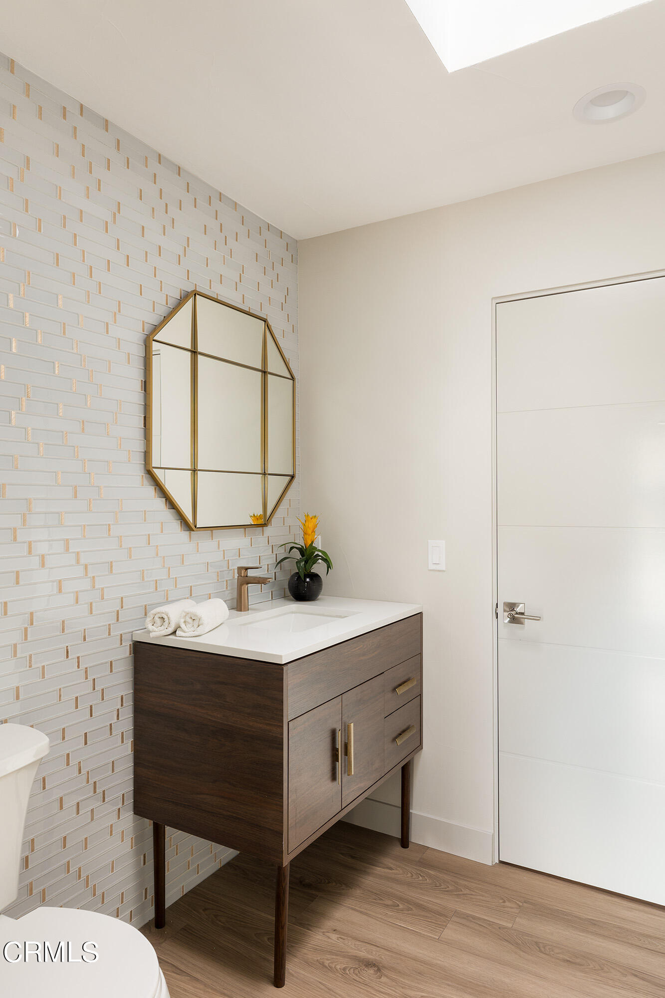 71817 Sahara Road Rancho Mirage, CA 92270 - Photo 14 of 25 a bathroom with a sink a mirror and a toilet