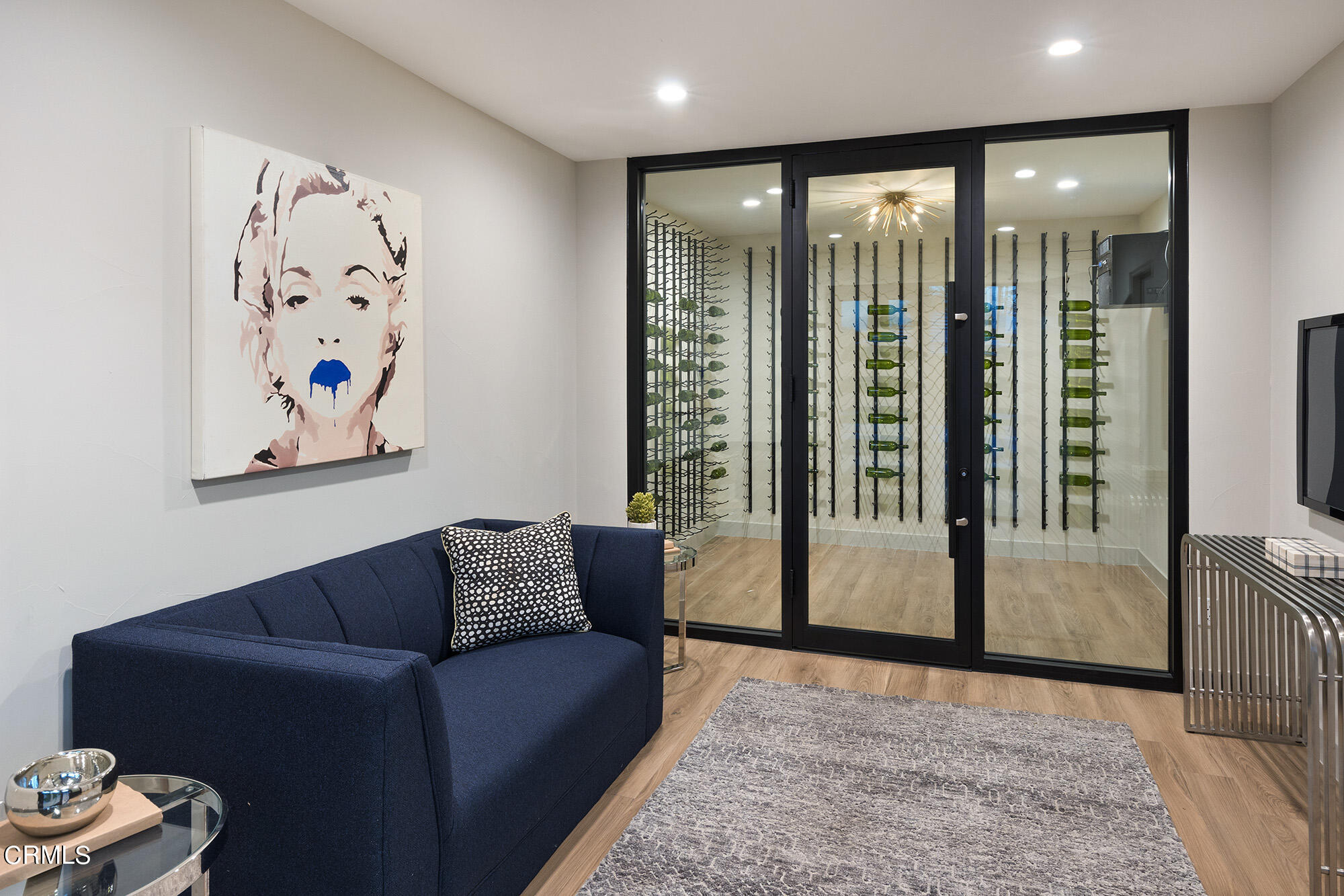 71817 Sahara Road Rancho Mirage, CA 92270 - Photo 18 of 25 a living room with furniture and a floor to ceiling window