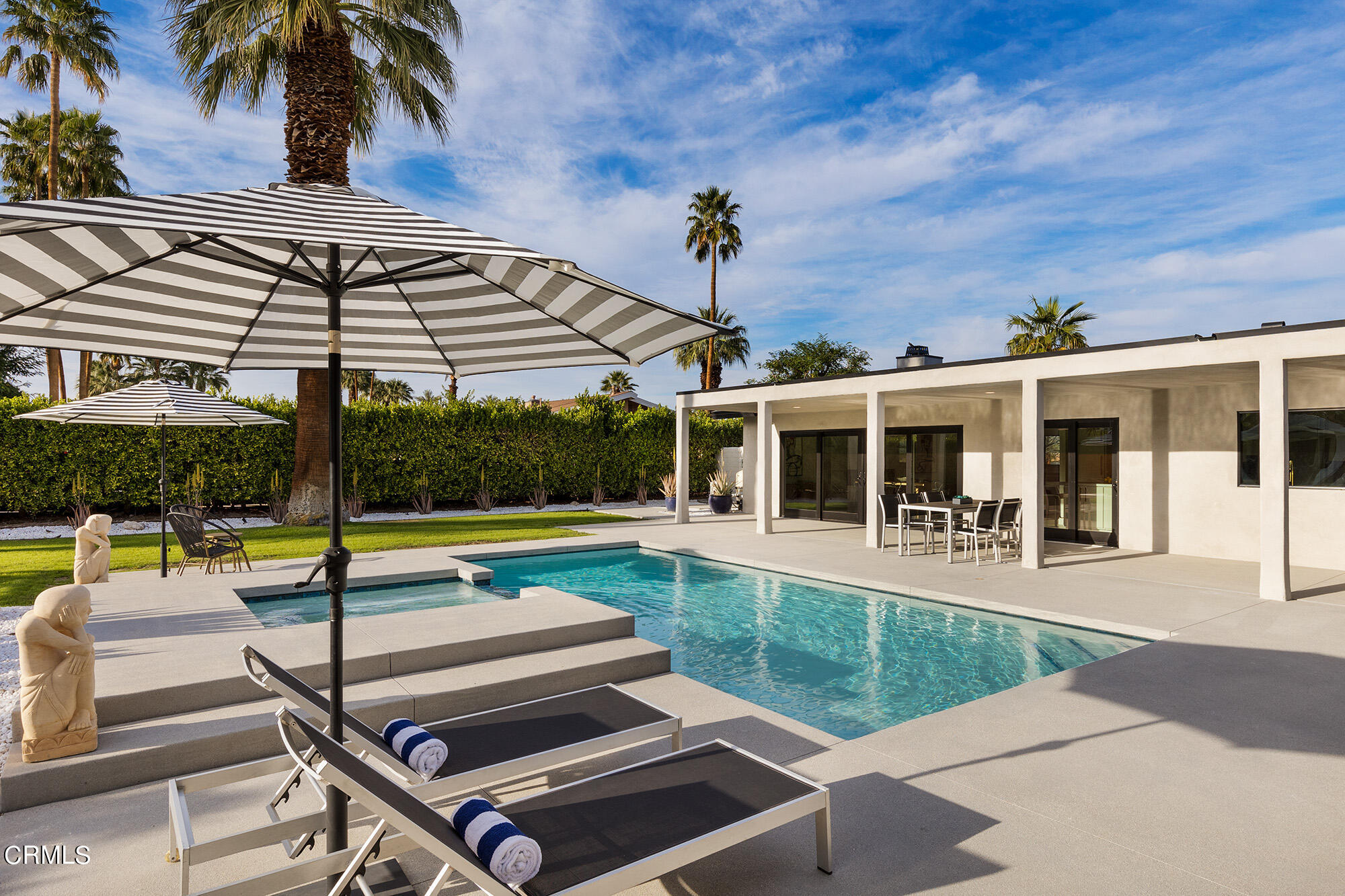 71817 Sahara Road Rancho Mirage, CA 92270 - Photo 24 of 25 a view of a backyard with swimming pool and furniture