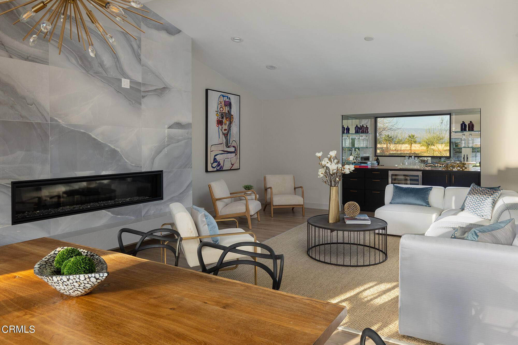 71817 Sahara Road Rancho Mirage, CA 92270 - Photo 4 of 25 a living room with furniture and a flat screen tv