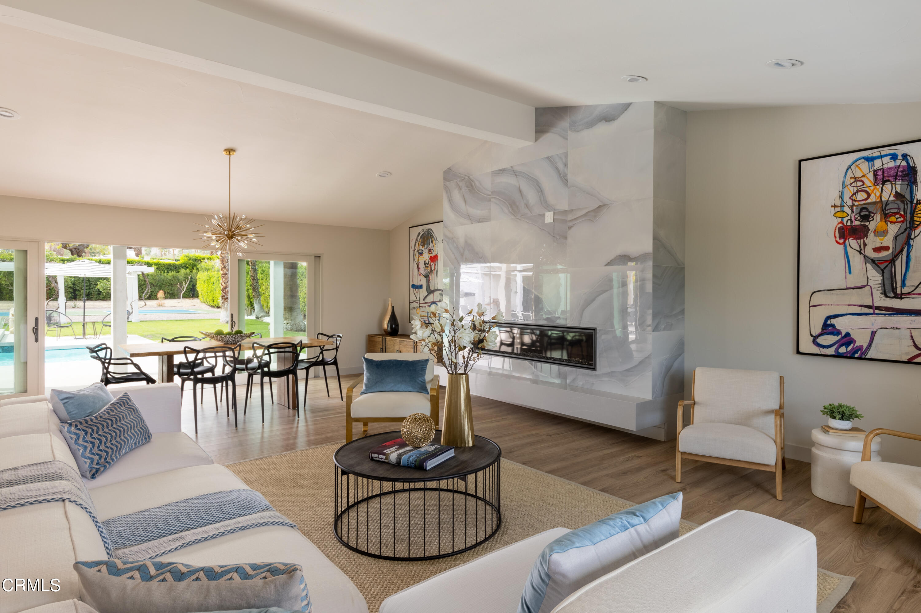 71817 Sahara Road Rancho Mirage, CA 92270 - Photo 6 of 25 a living room with furniture kitchen view and a large window